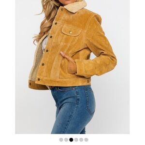 Women’s leather fleece lined crop jacket. Snaps, pockets, new without tags